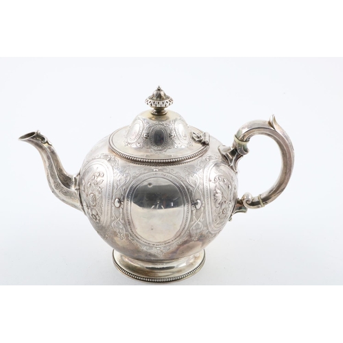 170 - A VICTORIAN TEAPOT. of circular form, with bead borders, a C-scroll handle and a domed cover, profus... 