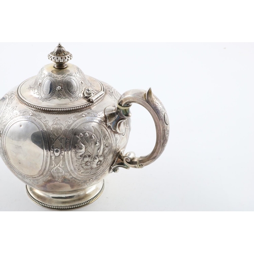 170 - A VICTORIAN TEAPOT. of circular form, with bead borders, a C-scroll handle and a domed cover, profus... 