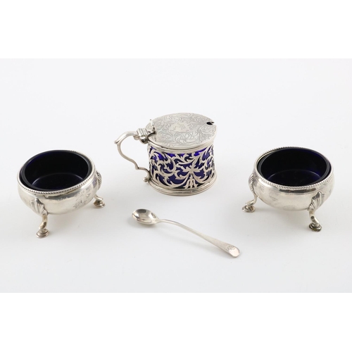 178 - A PAIR OF GEORGE III CIRCULAR SALTS. on three hoof feet and blue glass liners, crested, by Hester Ba... 