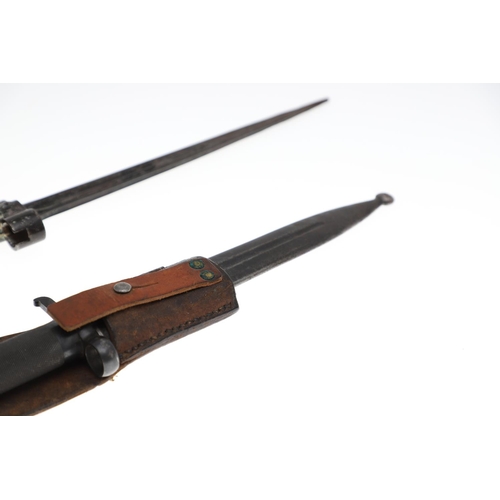 101 - A SWEDISH BAYONET AND SCABBARD AND ANOTHER SIMILAR. A Swedish Bayonet with a 21cm pointed sharpened ... 