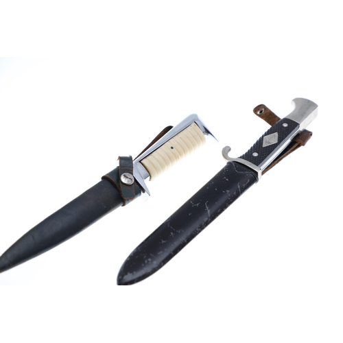 104 - A GERMAN SCOUTS KNIFE AND ANOTHER. A mid 20th Century German scout knife and scabbard with a 14cm po... 