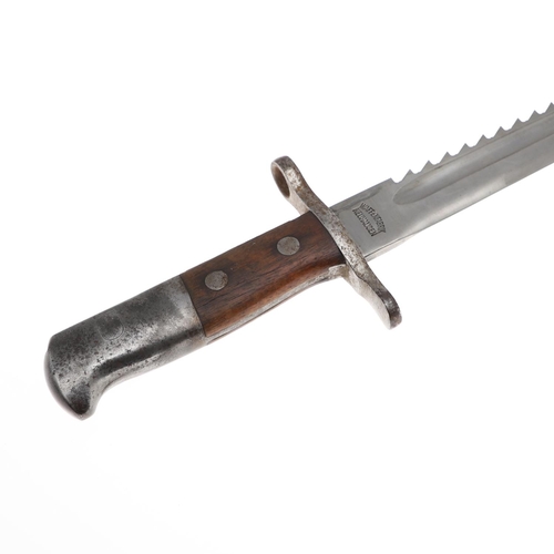 106 - A SWISS M.1914 SCHMIDT-RUBIN PIONEER'S BAYONET AND SCABBARD. With a 48cm saw-back blade, with pointe... 