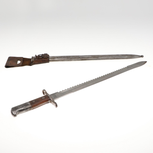 106 - A SWISS M.1914 SCHMIDT-RUBIN PIONEER'S BAYONET AND SCABBARD. With a 48cm saw-back blade, with pointe... 