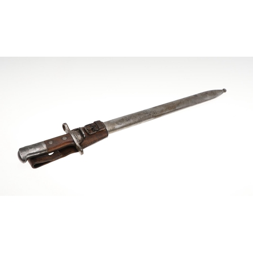 106 - A SWISS M.1914 SCHMIDT-RUBIN PIONEER'S BAYONET AND SCABBARD. With a 48cm saw-back blade, with pointe... 