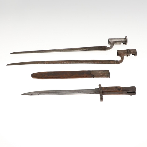 107 - A FIRST WORLD WAR CANADIAN ROSS BAYONET AND SCABBARD AND TWO SOCKET BAYONETS. A Canadian bayonet wit... 