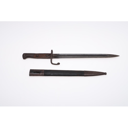 113 - A BRAZILIAN MAUSER BAYONET FOR THE BRAZILIAN ARMY. With a 29.5cm pointed, fullered blade, the cross ... 