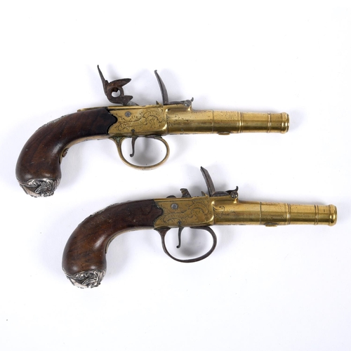 14 - A PAIR OF SILVER MOUNTED 18TH CENTURY FLINTLOCK PISTOLS BY HEYLIN OF CORNHILL. With 5cm tapering cir... 