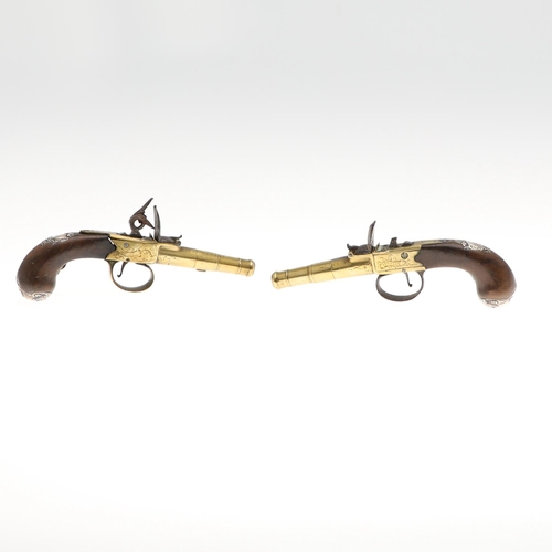 14 - A PAIR OF SILVER MOUNTED 18TH CENTURY FLINTLOCK PISTOLS BY HEYLIN OF CORNHILL. With 5cm tapering cir... 