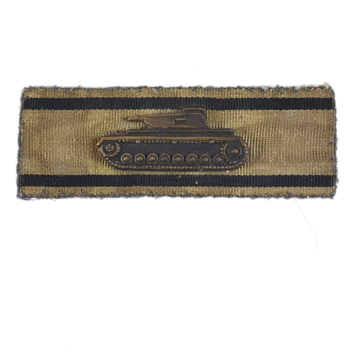 256 - A SECOND WORLD WAR GERMAN TANK DESTROYERS BADGE IN GOLD. A Tank Destroyers badge with black stripes ... 