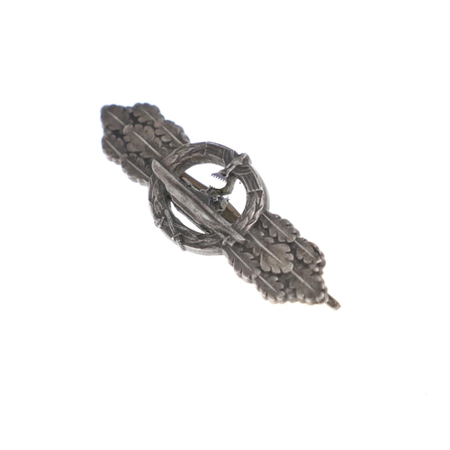 258 - A SECOND WORLD WAR GERMAN KRIEGSMARINE U-BOAT CLASP IN SILVER. A U Boat clasp with eagle with Swasti... 