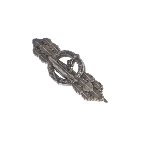 258 - A SECOND WORLD WAR GERMAN KRIEGSMARINE U-BOAT CLASP IN SILVER. A U Boat clasp with eagle with Swasti... 