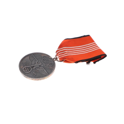 259 - A GERMAN 1936 OLYMPICS MEDAL AND RIBBON. A German 1936 Olympic Medal Second Class, the obverse with ... 