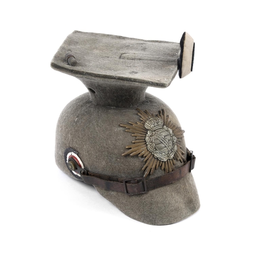 270 - A FIRST WORLD WAR SAXON ULAN FELT HELMET. An unusual Saxon Ulan helmet in thick grey felt body, larg... 