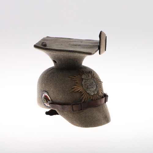 270 - A FIRST WORLD WAR SAXON ULAN FELT HELMET. An unusual Saxon Ulan helmet in thick grey felt body, larg... 