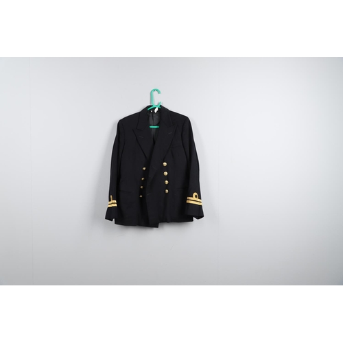 273 - A COLLECTION OF POST SECOND WORLD WAR NAVAL UNIFORM. A collection of uniform to include a medical of... 