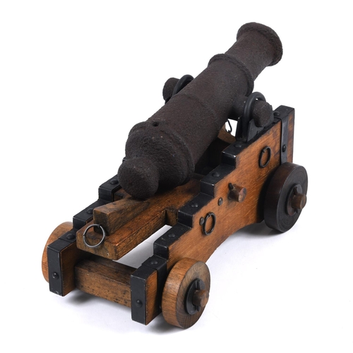 32 - A NINETEENTH CENTURY SIGNAL CANNON ON LATER CARRIAGE. A nineteenth century signal cannon with a 25cm... 