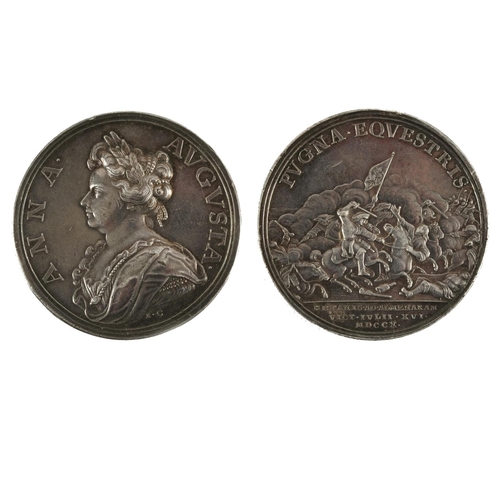 443 - A QUEEN ANNE SILVER MEDAL CELEBRATING THE BATTLE OF ALMENARA, 1710. A silver medal, obverse bust lef... 