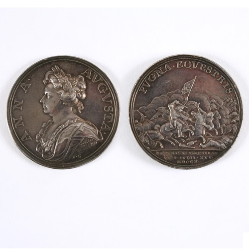 443 - A QUEEN ANNE SILVER MEDAL CELEBRATING THE BATTLE OF ALMENARA, 1710. A silver medal, obverse bust lef... 