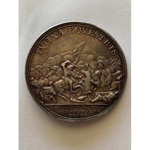 443 - A QUEEN ANNE SILVER MEDAL CELEBRATING THE BATTLE OF ALMENARA, 1710. A silver medal, obverse bust lef... 