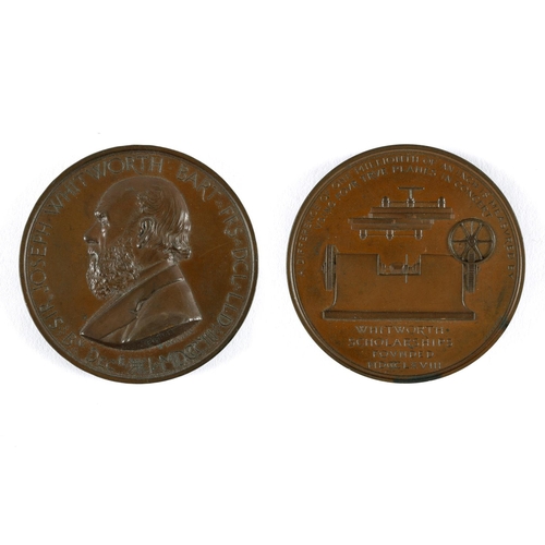 453 - A WHITWORTH SCHOLARSHIP BRONZE MEDAL, 1868. A bronze award medal, The obverse with a bust by A. Wyon... 