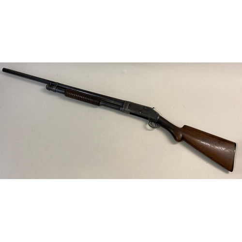 48 - A WINCHESTER 'MODEL 1897' PUMP ACTION SHOTGUN.  A Winchester 'Pump Action' 12 bore shotgun, engraved... 