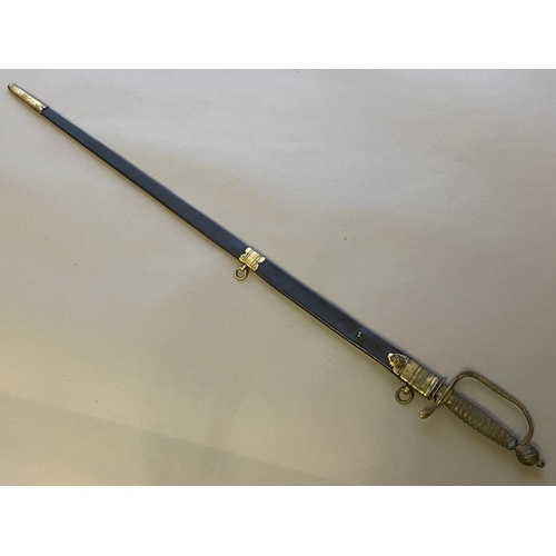 49 - A LATE 18TH CENTURY NAVAL OFFICERS SWORD. A sword with an 81cm pointed tapering fullered blade with ... 