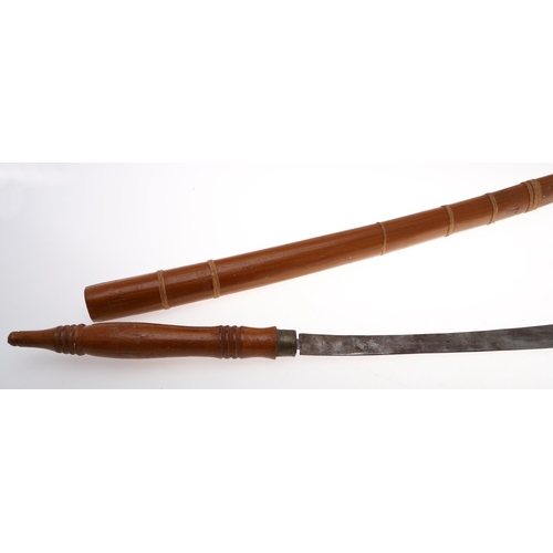 76 - A 20TH CENTURY DHA TYPE SWORD AND SCABBARD. With a 53cm curved blade with pointed tip and sharpened ... 