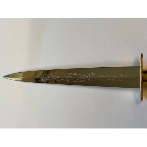 88 - A 50th ANNIVERSARY FAIRBAIRN SYKES DAGGER IN CASE. A Fairbairn Sykes style dagger with a 17.5cm doub... 