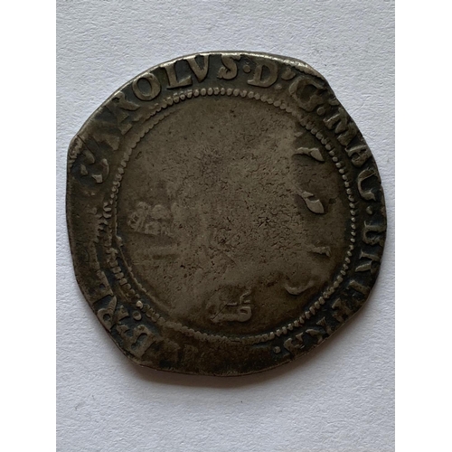 539 - A CHARLES I HALFCROWN 1645-6. A Charles I Halfcrown, King on Horseback, holding a sword and head in ... 