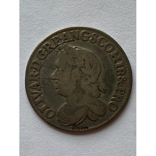 540 - AN OLIVER CROMWELL SHILLING. An Oliver Cromwell Shilling dated 1658, Draped bust l. Crowned shield. ... 