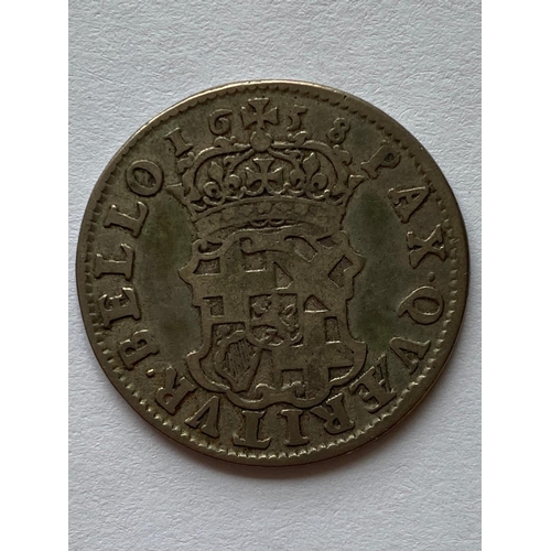 540 - AN OLIVER CROMWELL SHILLING. An Oliver Cromwell Shilling dated 1658, Draped bust l. Crowned shield. ... 