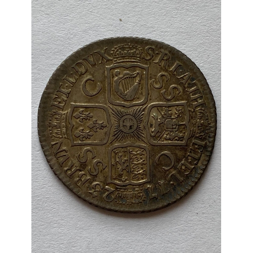 545 - A GEORGE I SHILLING. A George I Shilling dated 1723, first laureate and draped bust r. SSC in angles... 