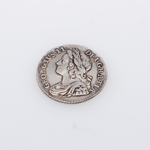 546 - A GEORGE II SHILLING, 1739. A George II Shilling, young laureate and draped bust l. Reverse with ros... 