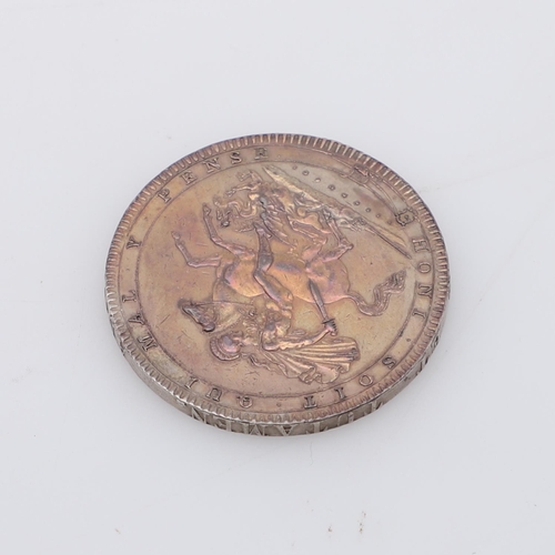 550 - A GEORGE III CROWN, 1819. A George III Crown, Laureate head r. reverse Pistrucci's St George and the... 