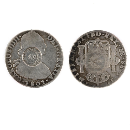 553 - A THISTLE BANK OVERSTAMPED MEXICAN 8 REALES COIN. A Mexican 8 Reales coin, Charles IV, r, Crowned sh... 