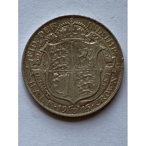 582 - A GEORGE V HALFCROWN, 1915. A George V Halfcrown dated 1915. Bare head l. Crowned shield in Garter. ... 