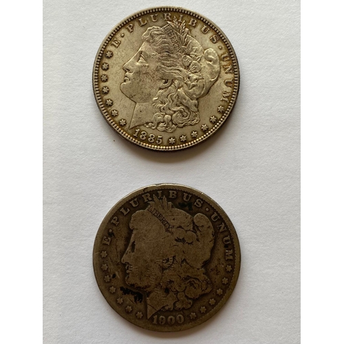 604 - AN 1885 U.S.A. DOLLAR AND A SIMILAR 1900 DOLLAR. An 1885 Dollar and a similar coin dated 1900.  *CR:... 