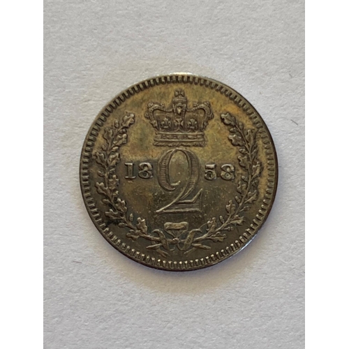 627 - A QUEEN VICTORIA MAUNDY TWO PENCE AND OTHER COINS. A Queen Victoria Maundy two pence dated 1858, Hal... 