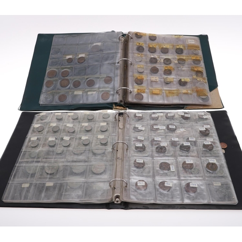 638 - A COLLECTION OF GREAT BRITAIN AND WORLD COINS. A collection of coins contained in six albums and a q... 