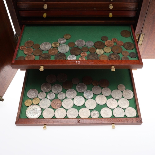 686 - A VICTORIAN MAHOGANY COIN CABINET AND CONTENTS. A Victorian Mahogany coin cabinet with a rectangular... 