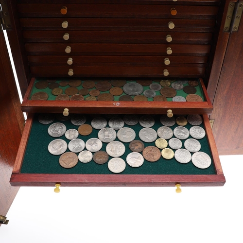 686 - A VICTORIAN MAHOGANY COIN CABINET AND CONTENTS. A Victorian Mahogany coin cabinet with a rectangular... 