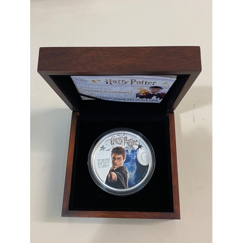 697 - A COLLECTION OF SILVER PROOF HARRY POTTER COINS AND OTHER SIMILAR MEDALS. A Samoa 2021 10 Dollar 'Pa... 