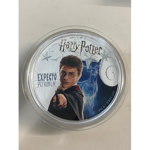 697 - A COLLECTION OF SILVER PROOF HARRY POTTER COINS AND OTHER SIMILAR MEDALS. A Samoa 2021 10 Dollar 'Pa... 