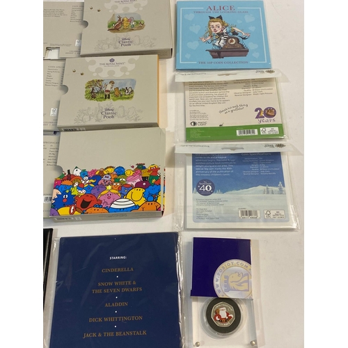 698 - A COLLECTION OF ROYAL MINT CHILDREN'S LITERATURE THEMED UNCIRCULATED 50p COINS. Childrens literature... 