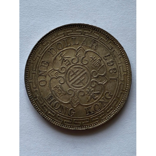 766 - A VICTORIAN HONG KONG TRADE DOLLAR. A Hong Kong Dollar dated 1867, obverse crowned bust l.  *CR:  Sl... 