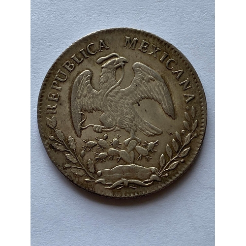 767 - A 19TH CENTURY MEXICAN LIBERTY 8 REALES COIN. A Mexican 8 Reales Coin dated 1868.  *CR:  slight wear... 