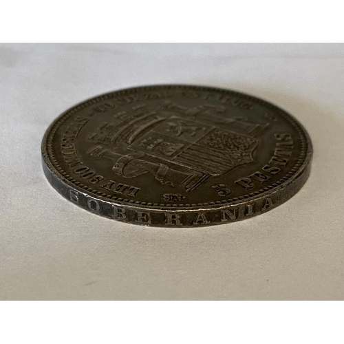 768 - A SPANISH SILVER 5 PESATAS COIN. A Spanish 5 Pesetas coin, dated 1870.  *CR:  Lightly rubbed.  *BP 2... 