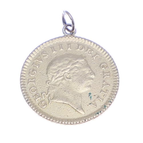 785 - A GEORGE III THIRD GUINEA, 1804. A George III third Guinea, laureate bust r. Crown with date 1804 to... 