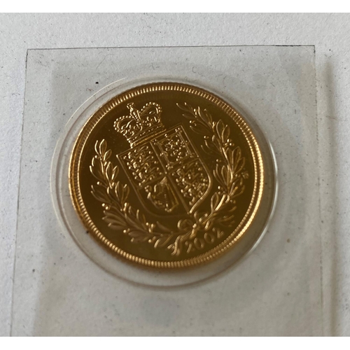 898 - A 2002 GOLDEN JUBILEE SOVEREIGN. A Queen Elizabeth II Sovereign dated 2002, uncirculated in plastic ... 