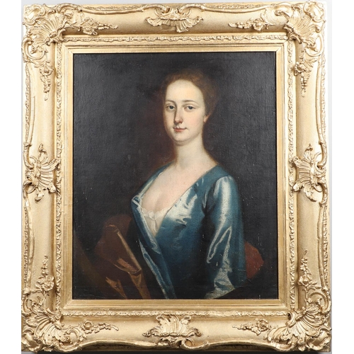 517 - JONATHAN RICHARDSON (1667-1745). Follower of. PORTRAIT OF A LADY. Long quarter length, wearing a blu... 